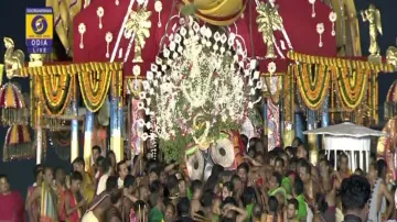 Lord Jagannath ‘slips’ during Pahandi Bije towards Adapa Mandap in Puri