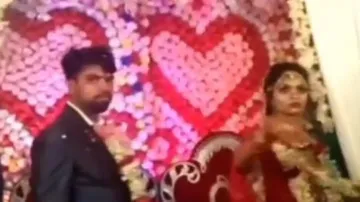 Angry bride throws sweets, water glass at wedding guests