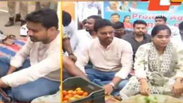 Odisha Chhatra Congress workers sell vegetables in Bhubaneswar