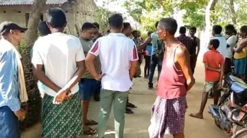 Men feast on human flesh