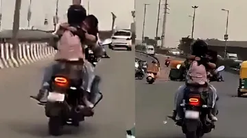 Girl, boy caught romancing on bike in Delhi, penalised after video goes viral