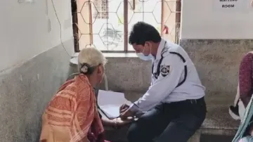 Security guard checks blood pressure of patient at Odisha hospital, doctor transferred