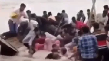 Indian version of Titanic! Scores of people stumble into water after overloaded boat trembles; watch