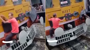 Men sit outside train bogie to travel without ticket; watch
