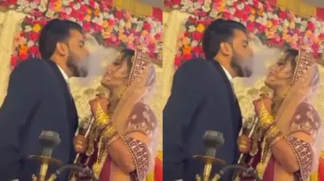 Bride, groom kiss each other while smoking hookah; internet reacts