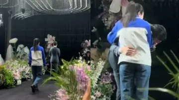 Chinese bride surprises groom by walking down the aisle in school uniform