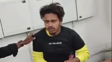 Youth stealing clothes from mall