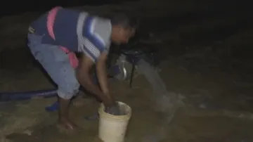 Farmers making last-ditch attempts to save paddy plants in dry lands in Odisha’s Balasore 