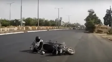 Scooter Rider Falls after Hitting Kia Seltos
