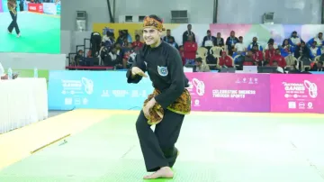 An athlete performs in pencak silat event