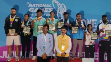 Odisha athletes pose with their medals