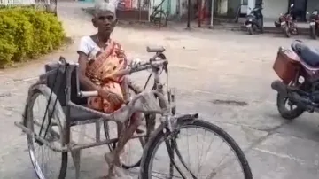 OTV Impact: Divyang woman found crawling to bank to withdraw pension, gets tricycle  