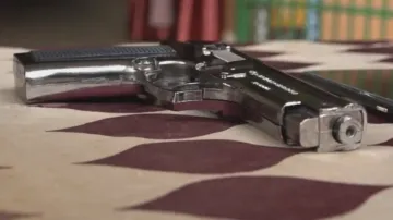 Car Looted On Gun Point