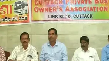 Members of the Cuttack Private Bus Owners' Association briefing media during a press meet. 