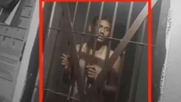 The accused inside jail after getting arrested by the police.