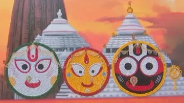 Wall painting of 'Holy Trinity' with bottle caps.