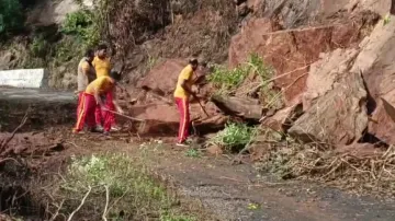 Firefighters Clear Road After Landslide In Koraput