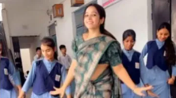 Watch: School teacher performs ‘Gulabi Sharara’ dance in saree with her students; video goes viral