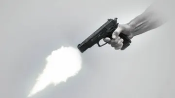 Businessman shot at, robbed by gang of armed assailants; 15 kg silver looted
