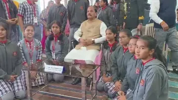 Odisha Governor Raghubar Das interacts with students in Sonepur