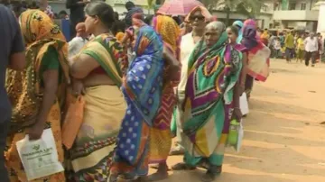 Elderly people suffer scorching sun, long queues to collect govt allowance