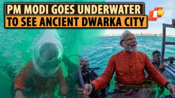 PM Modi Offers Prayers Before Submerged Dwarka City By Diving Underwater In Gujarat 