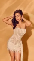 Avneet Kaur Radiates Elegance In Cream Bodycon Dress; Check Pics