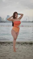 Nehhaa Malik Dazzles In Vibrant Orange Cutout Monokini Photoshoot