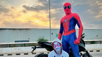 ‘Spiderman’ arrested with girlfriend  for riding bike without helmet - Watch