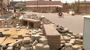 Puri servitors see red over deplorable road conditions outside Parikrama Prakalpa 