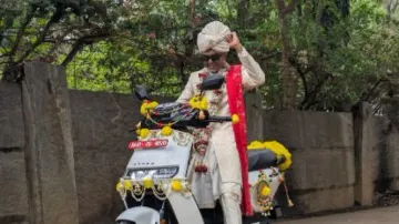 No horse or luxury car, Bengaluru groom makes grand entry on electric scooter - Watch