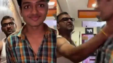Father slapping son