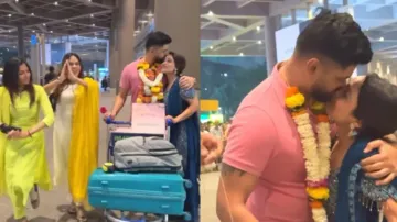 Influencer's heartfelt airport welcome for fiancé sparks debate on privacy – Watch