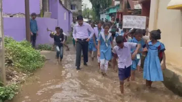 Odisha students force BDO, tehsildar to walk on muddy road to school 