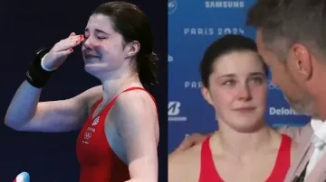 Father consoling his daughter after Olympics loss is the best video on Internet today - Watch