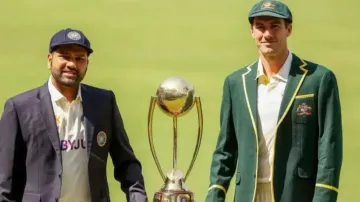 Rohit Sharma and Pat Cummins with Border Gavaskar Trophy