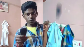 Young boy's epic cell phone toss lands perfectly in t-shirt pocket; video goes viral