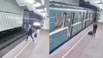 Scary! Girl jumps in front of running train, walks out unhurt miraculously; watch
