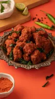 Crispy Chicken 65 recipe: A flavourful and spicy Indian snack