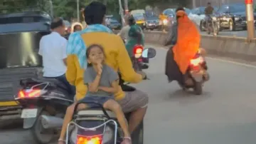 Video of little girl cheerfully posing on scooter sparks safety concerns on social media
