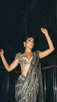 Shriya Saran Turns Heads In Silver And Black Saree Photoshoot