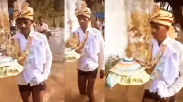 Indian groom braves floodwater in underpants to reach bride's house, watch