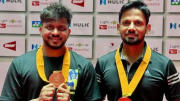 Deep Ranjan Bisoyee and Dileswar Rao pose with their bronze medals