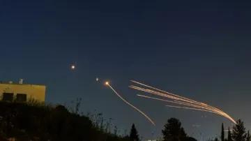 Hezbollah fires 200 rockets at northern, central Israel, injuring eight