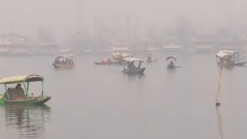 Tourists enjoying boat ride in Dal lake