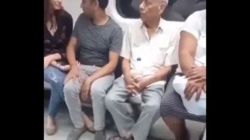 Delhi Metro: Couple fails to control, gets intimate in train; stern action demanded
