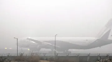 Thick fog blankets Delhi affecting train and flight services