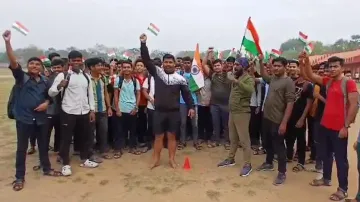 Fans cheer for team India in Odisha