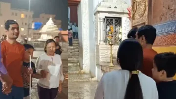 Young boy escorts visually impaired parents to Lord Jagannath Temple in Odisha Puri