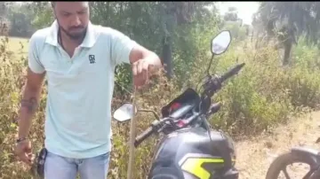 Two Odisha youths travel 22 km with poisonous snake on their bike!